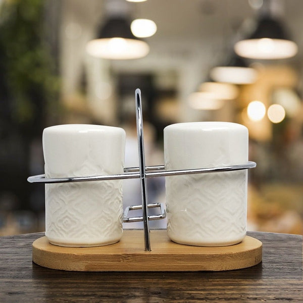 Private: White Curvy Stylish Ceramic Salt & Pepper Shaker Set With Bamboo Base And Stainless Steel Stand